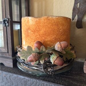 Very unique, vintage orange candle with acorns
